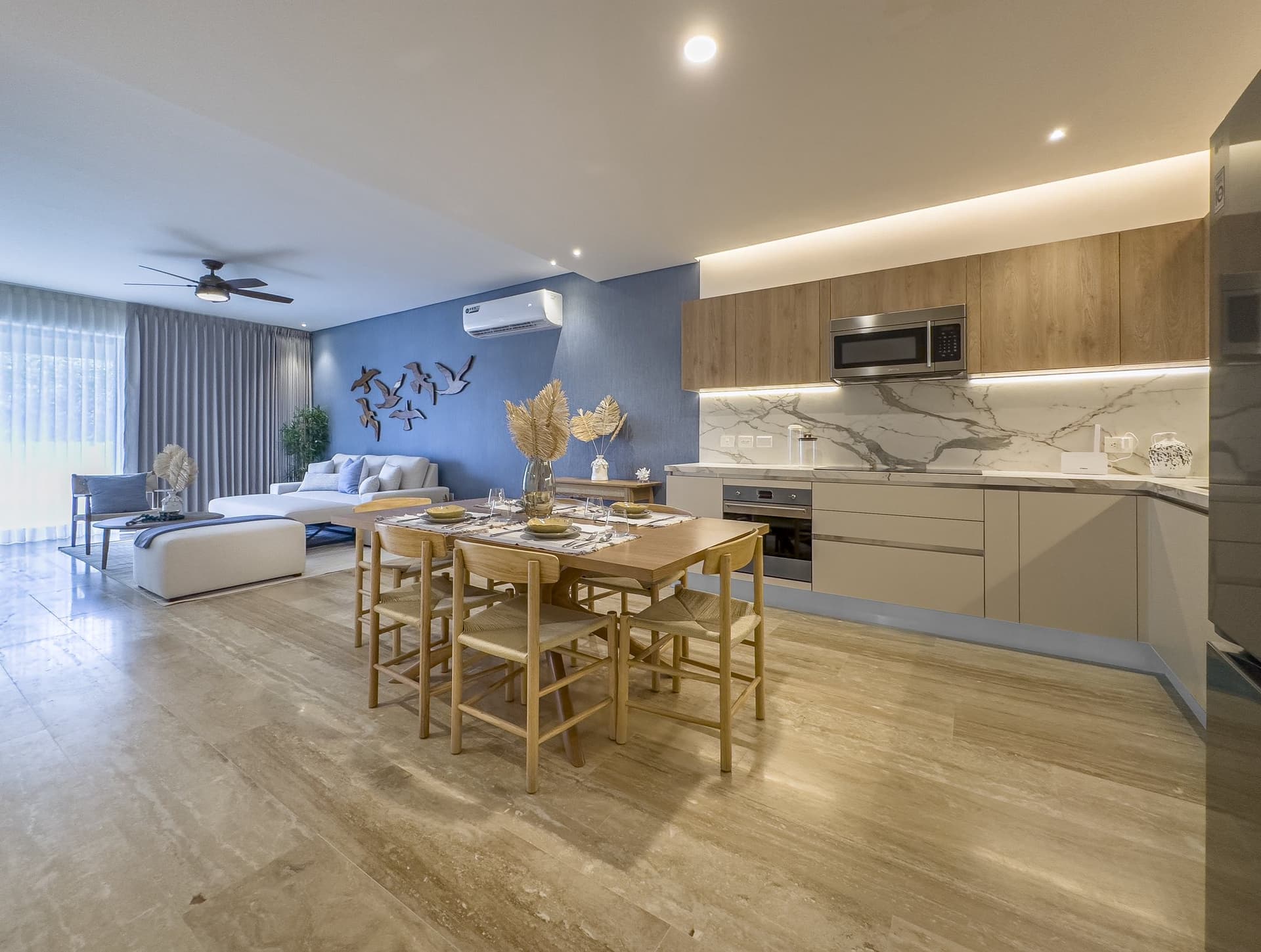 Furnished and styled vacation rental — dining, kitchen, living