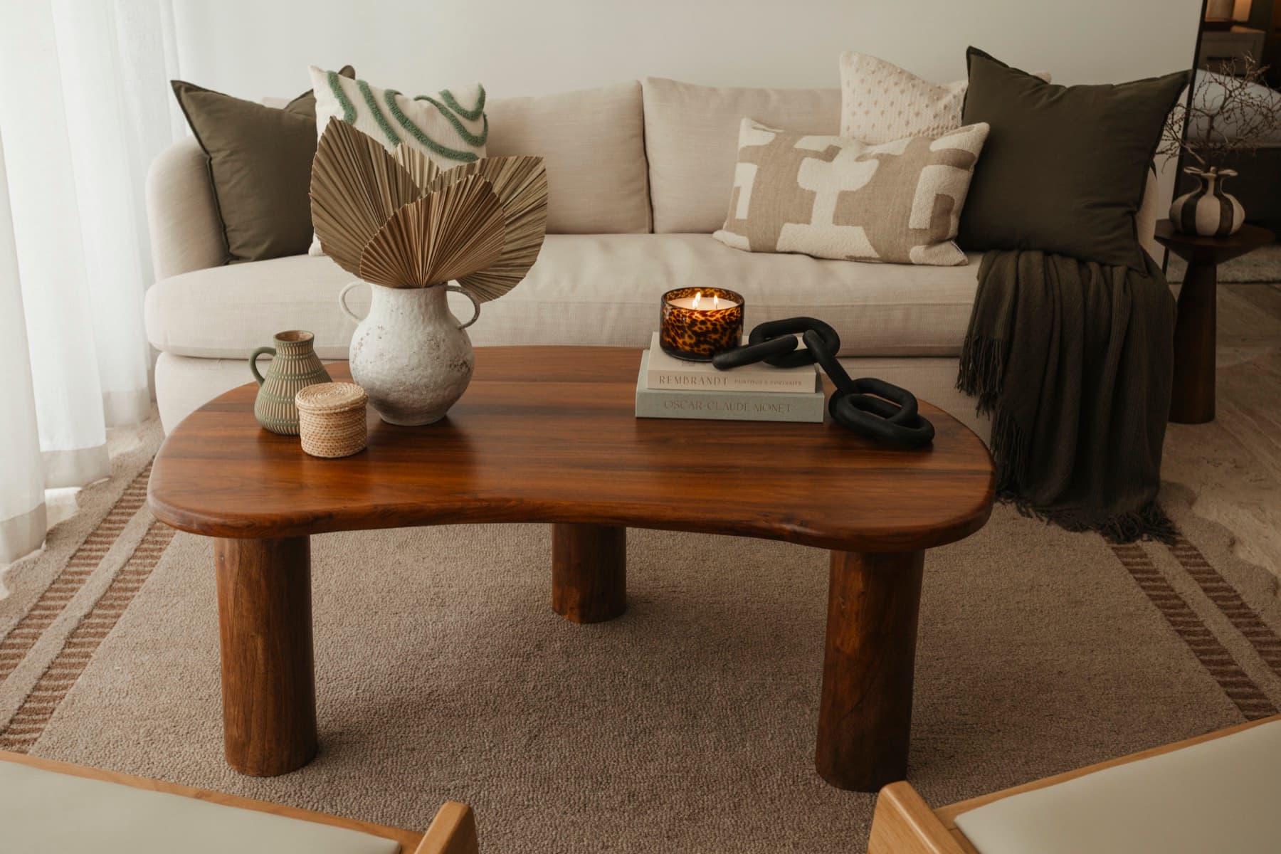 Ceiba at 25 living room seating and coffee table styling