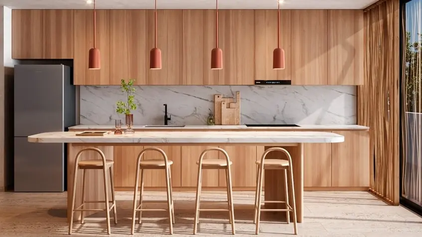 Modern kitchen with marble island at The Curve Tulum